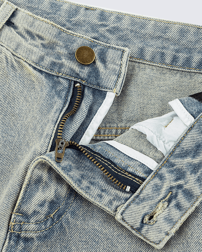 Wide-Leg Denim Jeans with Buttoned Hem